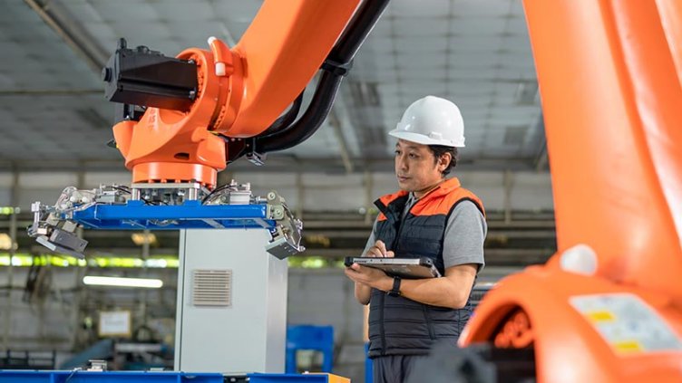 A worker is working in factory