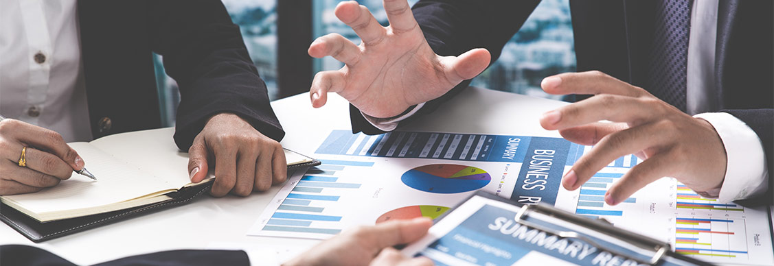 Business people are discussing about static report
