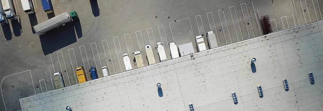 Aerial view of trucks loading at logistic center