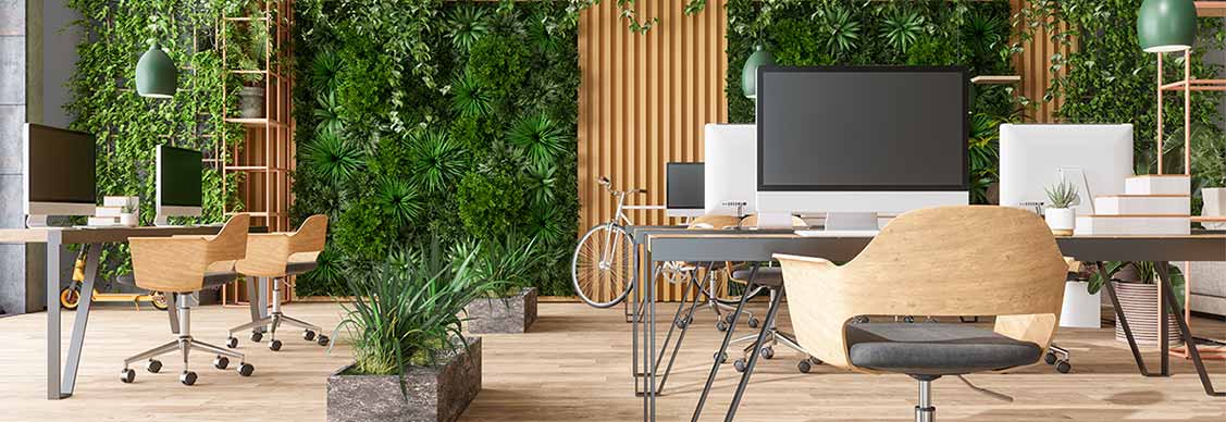 Eco-Friendly Open Plan Modern Office With Tables, Office Chairs, Pendant Lights, Creeper Plants And Vertical Garden Background