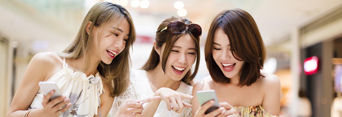 girls browsing through phone