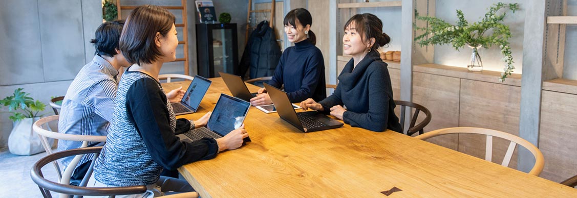 Young business people working in green office