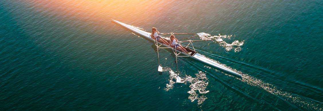 Women rowing in a boat