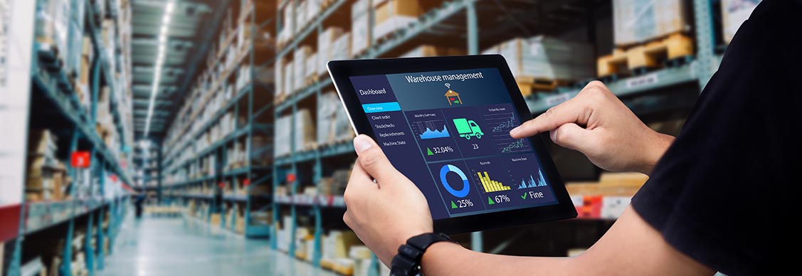 Employee checking the data on the tablet
