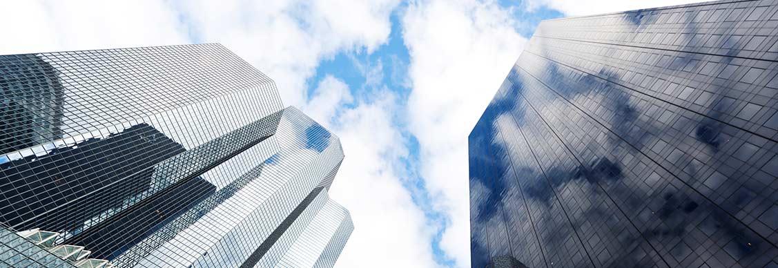 View looking up at high rise buildings