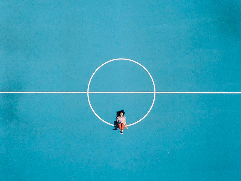 Girl sitting in a circle