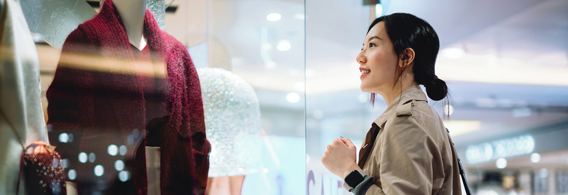A girl looking at dress