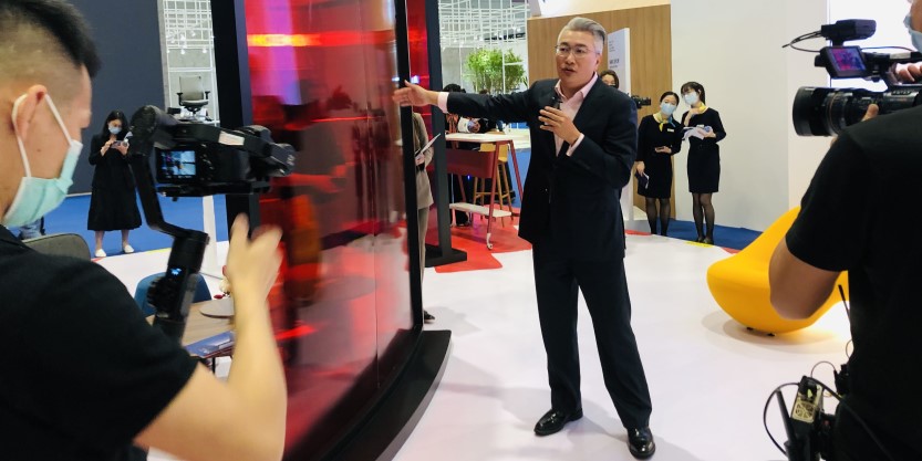 A man introducing a board