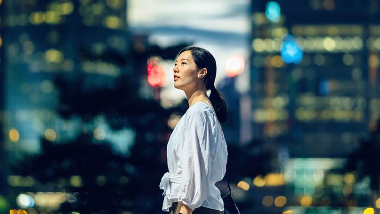 A woman standing in the road