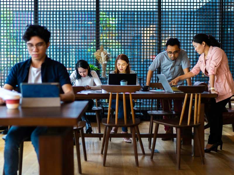 Corporate workers working in a leased office