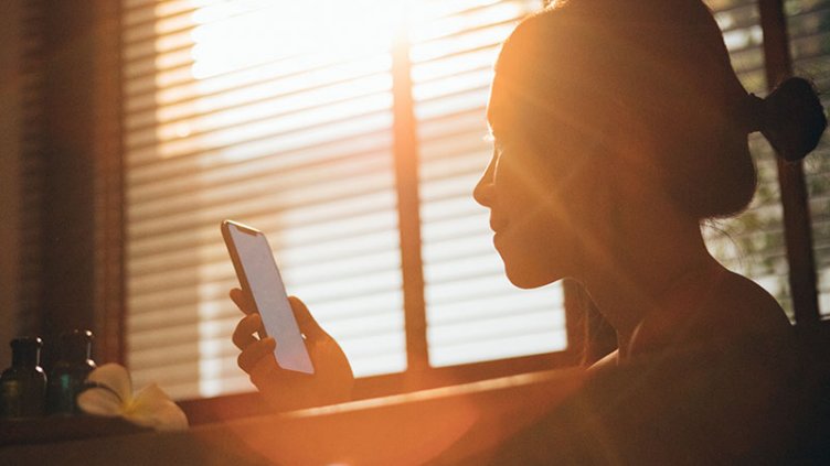 A girl using a mobile phone