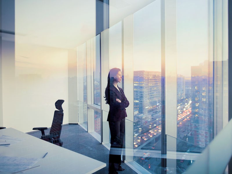 A woman looking out from the window