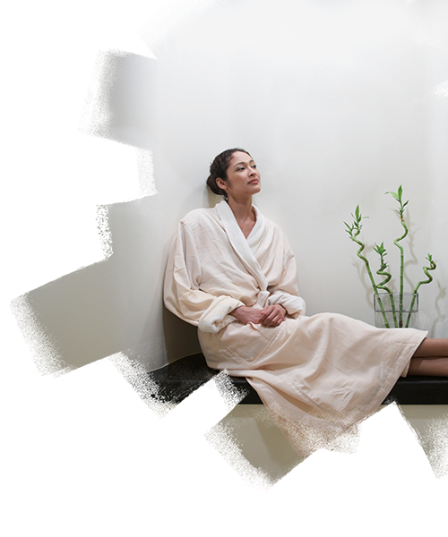 A woman relaxing inside the hotel room